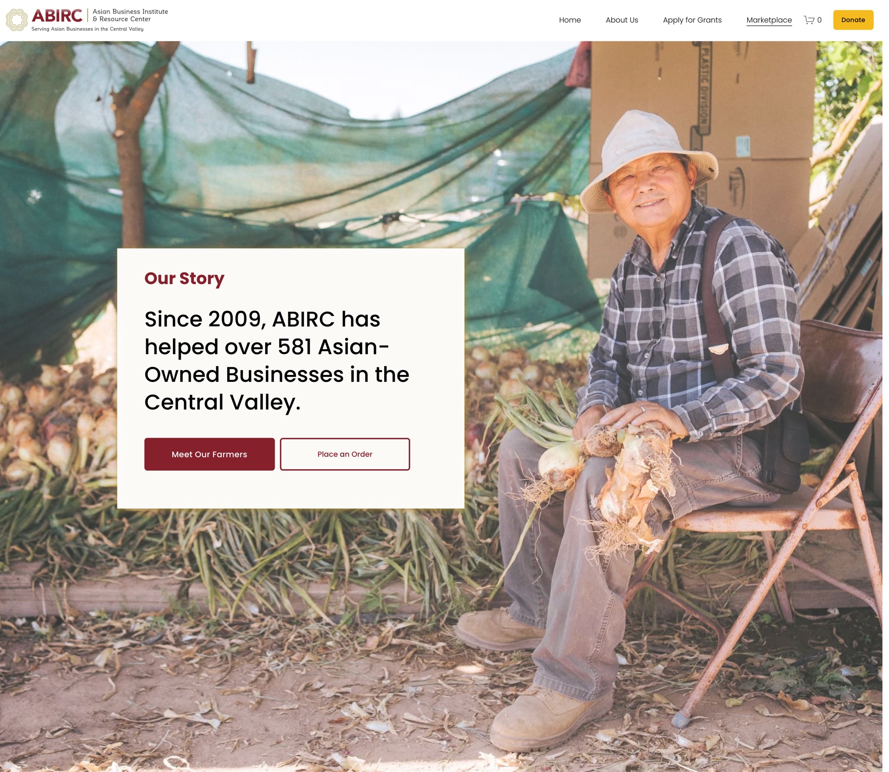 An ABIRC farmer sits with a fresh onion harvest at the Central Valley farm, in front of a shaded growing tent — from ABIRC's 'Our Story' section.
